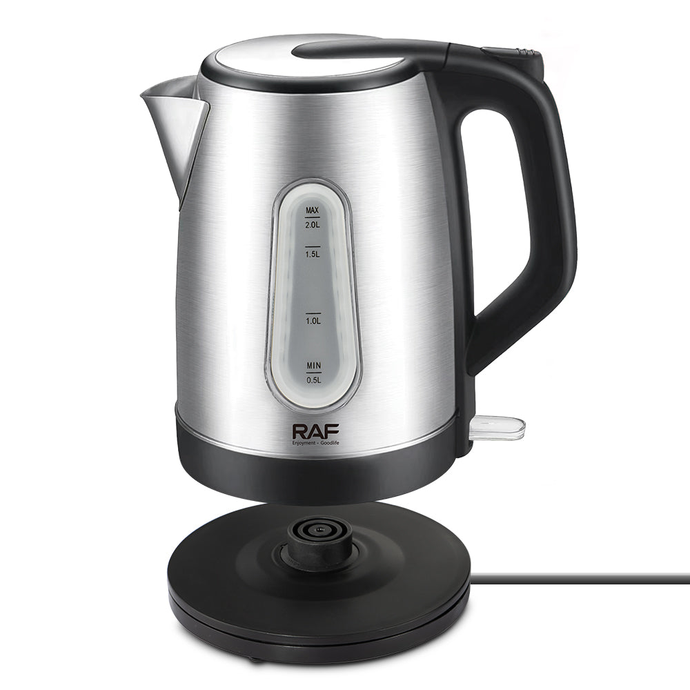 Silver electric kettle with black handle and base on a white background
