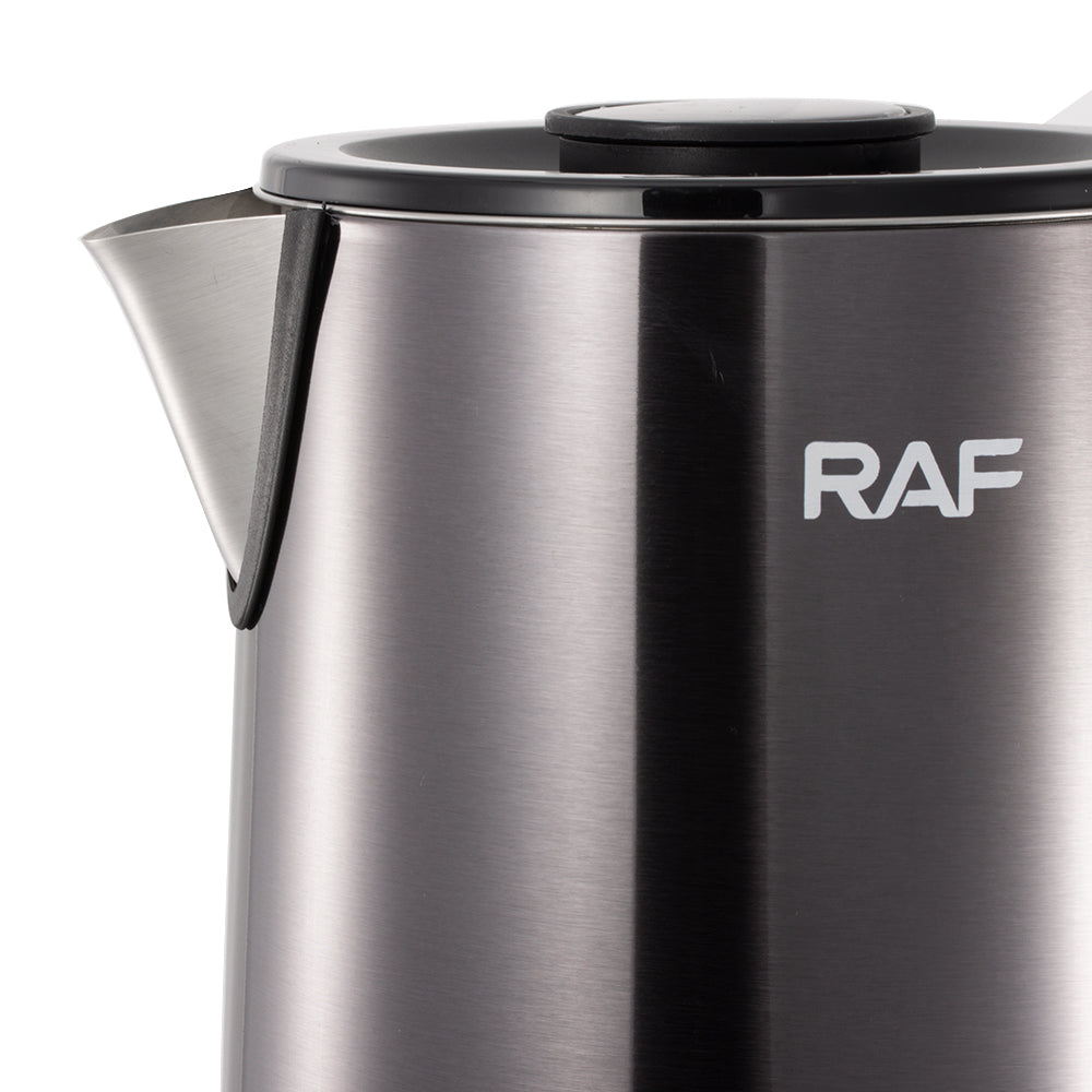 Stainless steel kettle with RAF logo on a white background