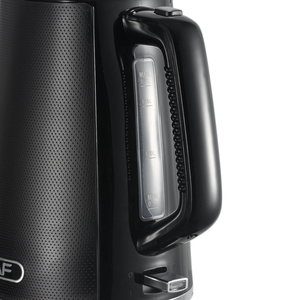Close-up of a black speaker with a handle on a white background