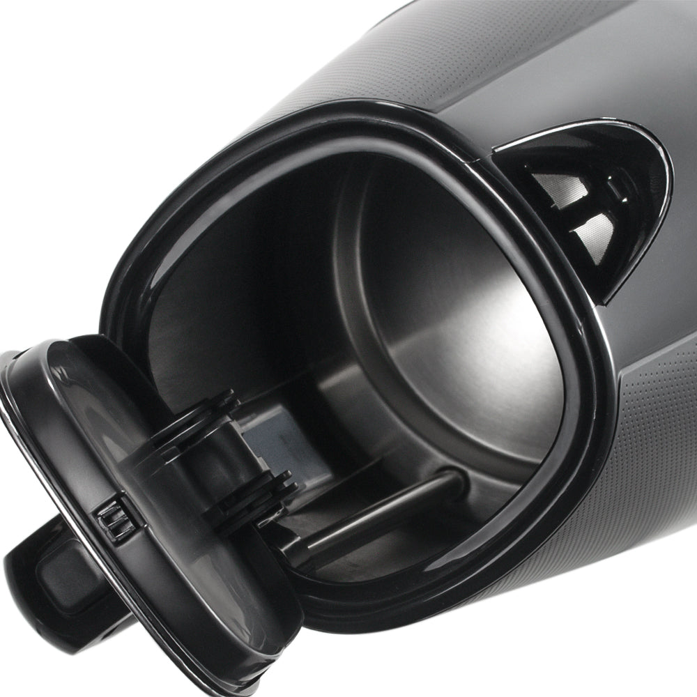 Close-up of a black car cup holder with a white background