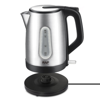 Silver electric kettle with black handle and base on a white background