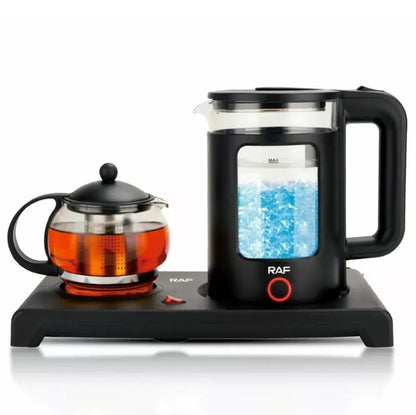 Black electric tea maker with glass teapot on a white background