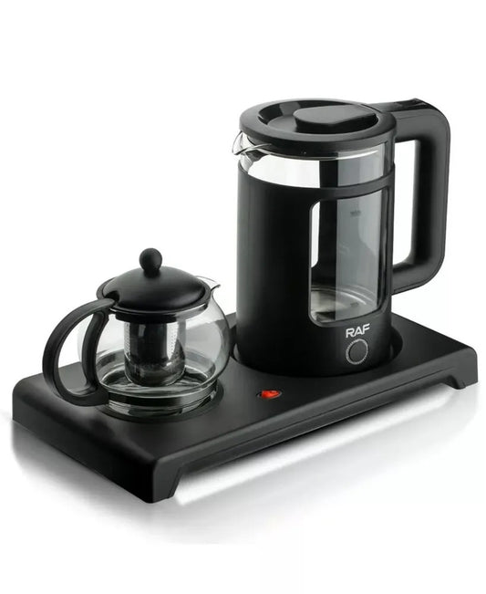 Black electric kettle with glass carafe on a white background