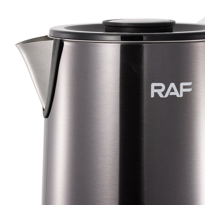 Stainless steel kettle with RAF logo on a white background