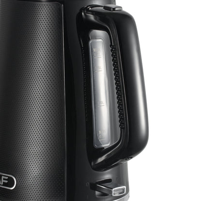 Close-up of a black speaker with a handle on a white background